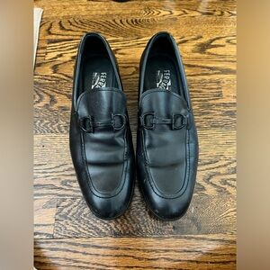 Salvatore Ferragamo genuine leather slip-on shoes. Black.